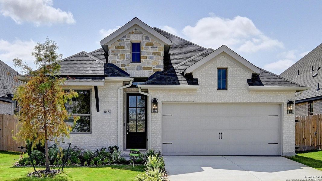 Front exterior of a new home in Kallison Ranch 45', San Antonio, TX, highlighting curb appeal (Image 21).