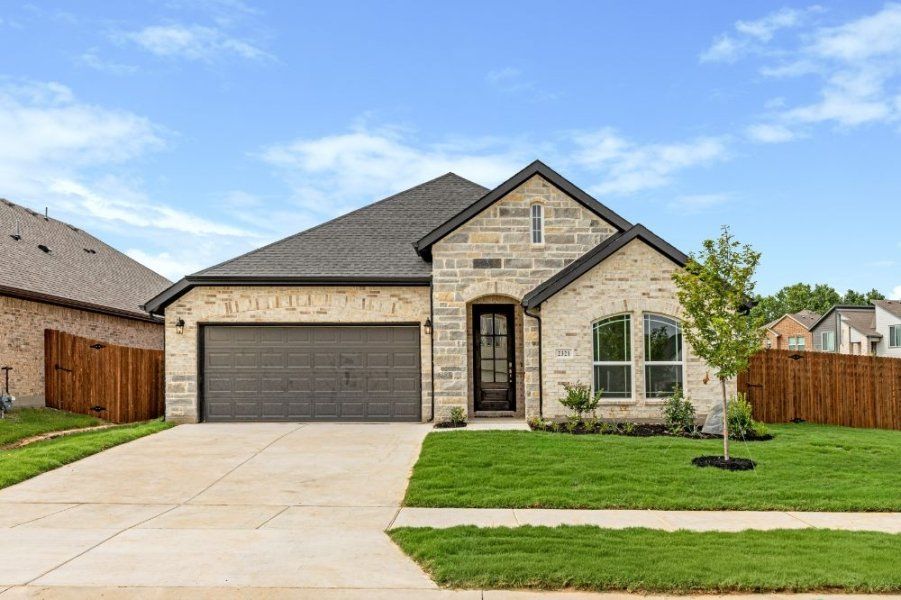 Representative exterior photo of a completed home built from the Brazos by UnionMain Homes in Elevon, Lavon, TX (Image 21).