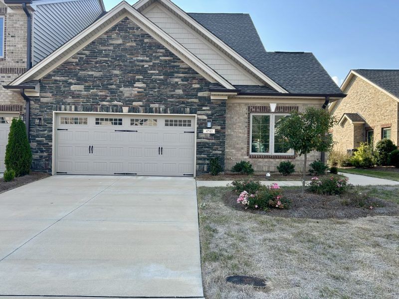 Front exterior of a new home in Trellises, High Point, NC, highlighting curb appeal (Image 23).