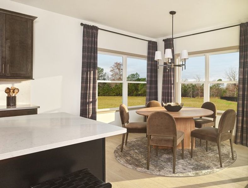 Representative furnished interior of a home built from the Benson by Ashton Woods in The Point, Rolesville (Image 8).
