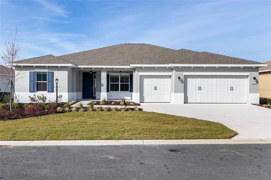 Front exterior of a new home in , Ocala, FL, highlighting curb appeal (Image 1). Front exterior of a new home in , Ocala, FL, highlighting curb appeal (Image 1).