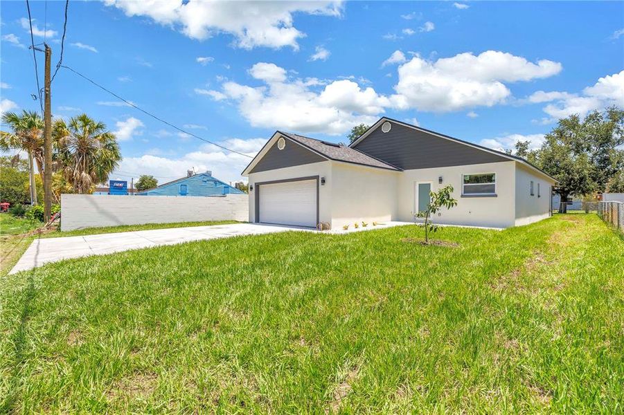 Front exterior of a new home in , St. Petersburg, FL, highlighting curb appeal (Image 21).