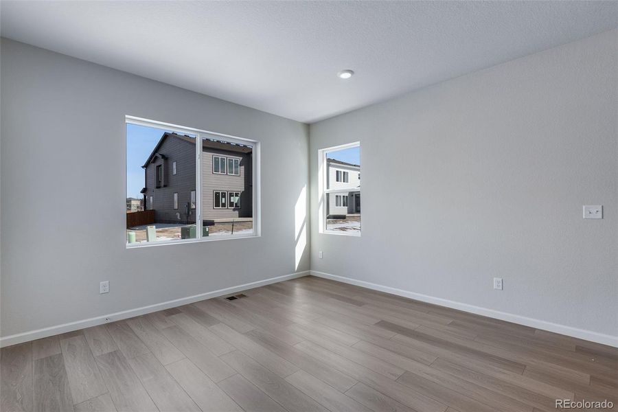 Spacious, unfurnished interior of a new home in Medley at Reunion Ridge, Commerce City (Image 20).