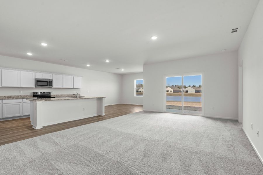 Representative unfurnished interior of a home built from the Europa by Starlight Homes in Andalusia, Loris (Image 16).