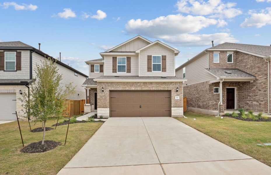 Front exterior of a new home in Crosswinds, Kyle, TX, highlighting curb appeal (Image 5).