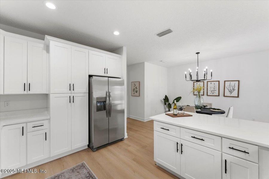 Furnished interior view inside a new home in , Fleming Island (Image 12).