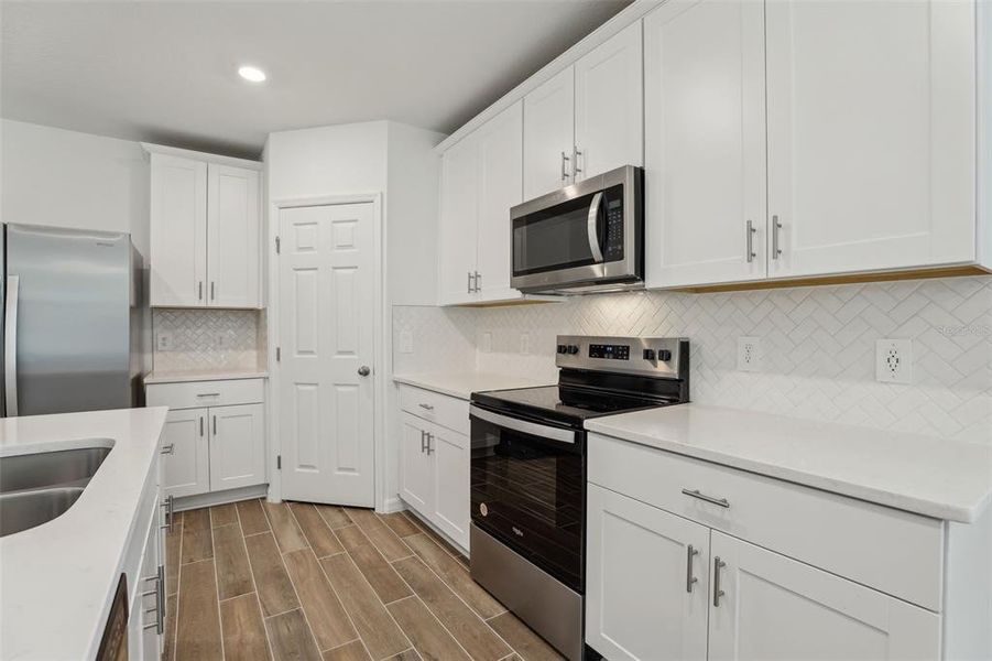 Furnished interior view inside a new home in Lawson Dunes - Signature Series, Haines City (Image 27).