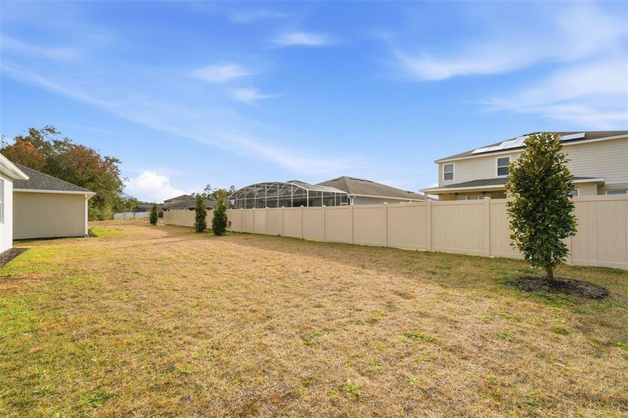 Exterior details and patio area of a home in Acuera Estates, Apopka (Image 23).