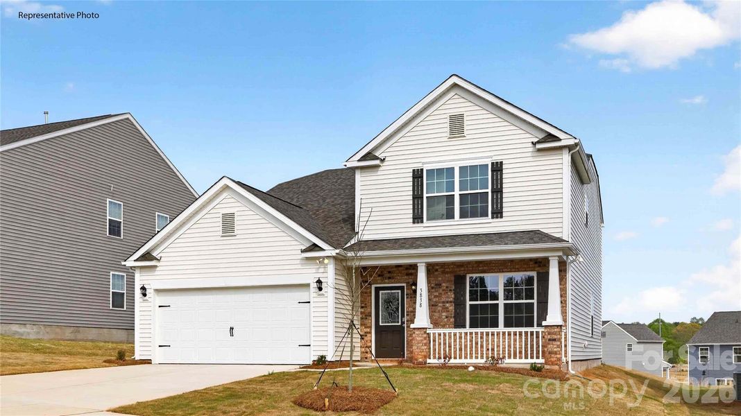 Front exterior of a new home in The Hamptons at Hickory, Hickory, NC, highlighting curb appeal (Image 1). Front exterior of a new home in The Hamptons at Hickory, Hickory, NC, highlighting curb appeal (Image 1).