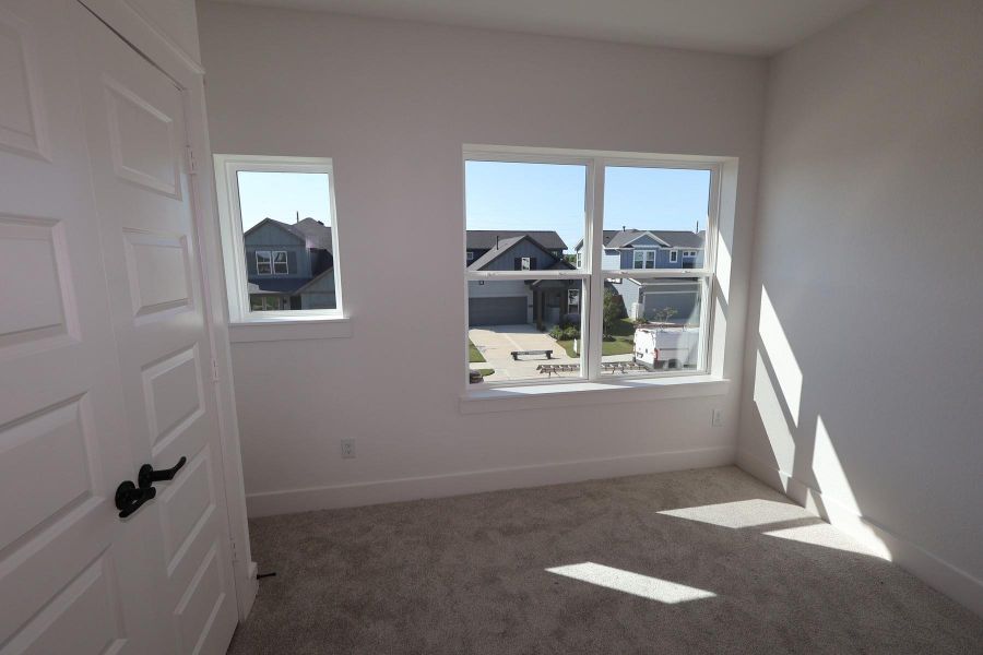 Spacious, unfurnished interior of a new home in Elyson - Grove Row Collection, Katy (Image 10).