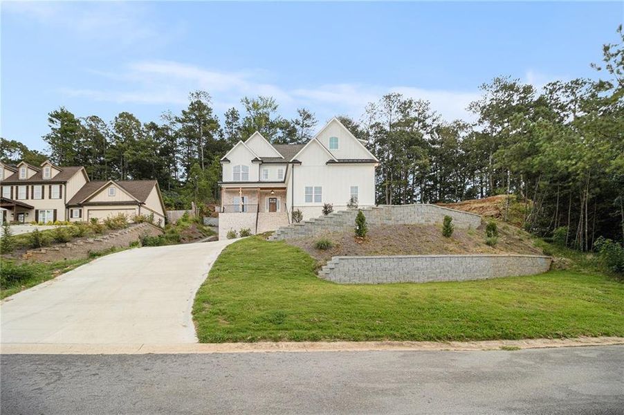 Front exterior of a new home in , White, GA, highlighting curb appeal (Image 28).