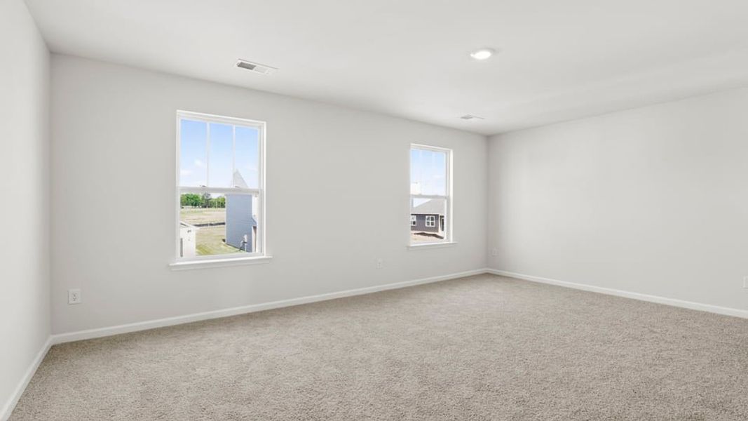 Spacious, unfurnished interior of a new home in Durbin Meadows Traditions, Fountain Inn (Image 30).