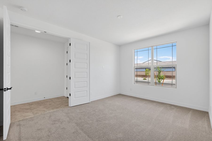 Spacious, unfurnished interior of a new home in Artisan at Asante, Surprise (Image 25).