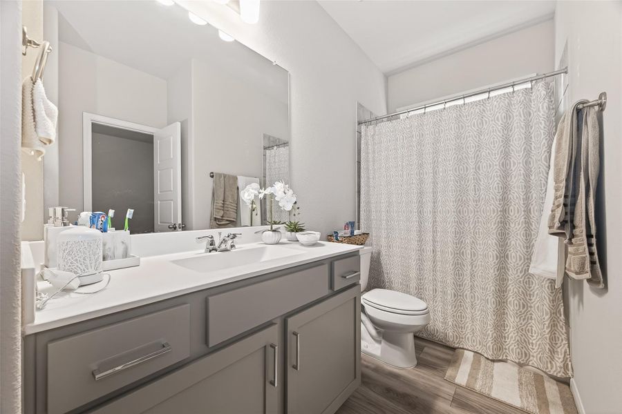 High-quality finishes carry through every corner of the home, ensuring a cohesive and upscale feel in every room.