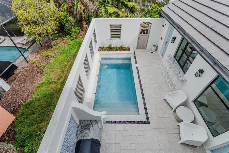 Exterior details and patio area of a home in , Palm Coast (Image 39).