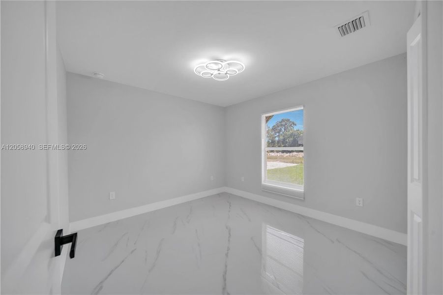 Spacious, unfurnished interior of a new home in , Lehigh Acres (Image 12).