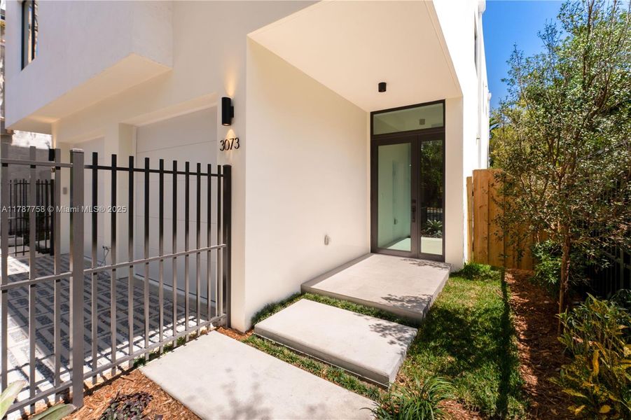 Front exterior of a new home in , Miami, FL, highlighting curb appeal (Image 1).