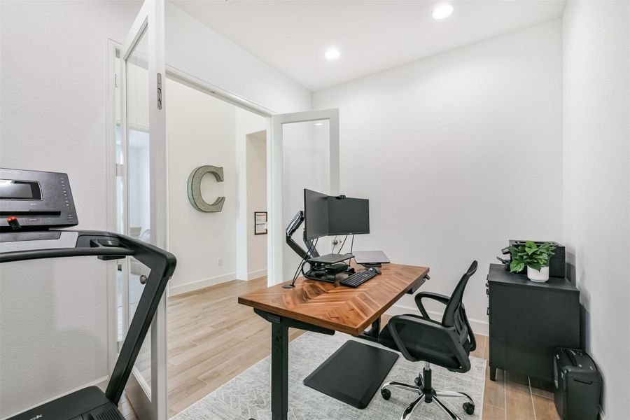 Private home office across from the game room. Private home office across from the game room.