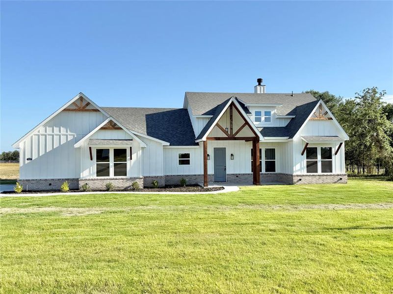 Front exterior of a new home in , Weatherford, TX, highlighting curb appeal (Image 17).