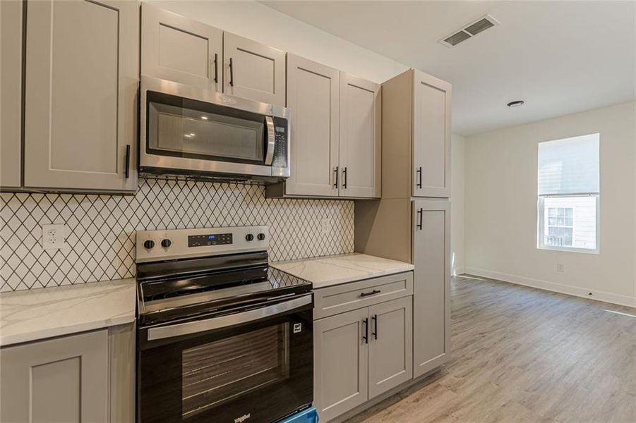 Furnished interior view inside a new home in , Stone Mountain (Image 11). Furnished interior view inside a new home in , Stone Mountain (Image 11).