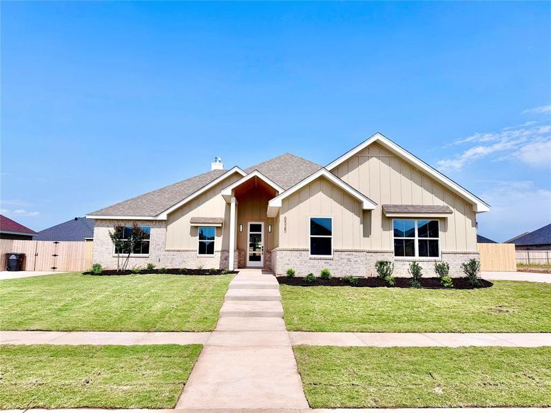 Front exterior of a new home in , Abilene, TX, highlighting curb appeal (Image 1). Front exterior of a new home in , Abilene, TX, highlighting curb appeal (Image 1).