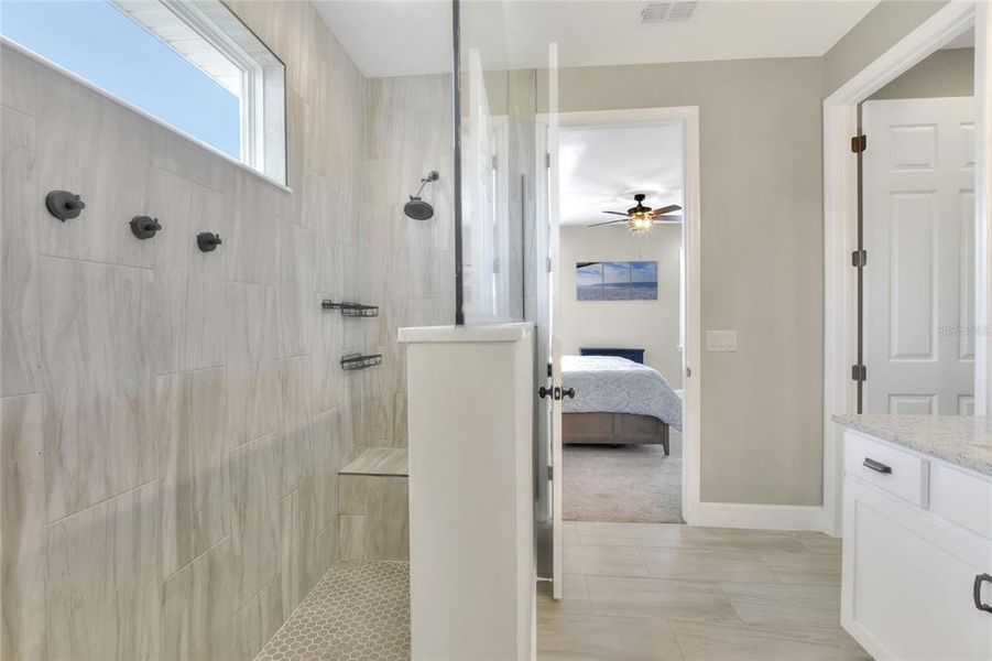 Walk-in shower in Primary Bathroom.