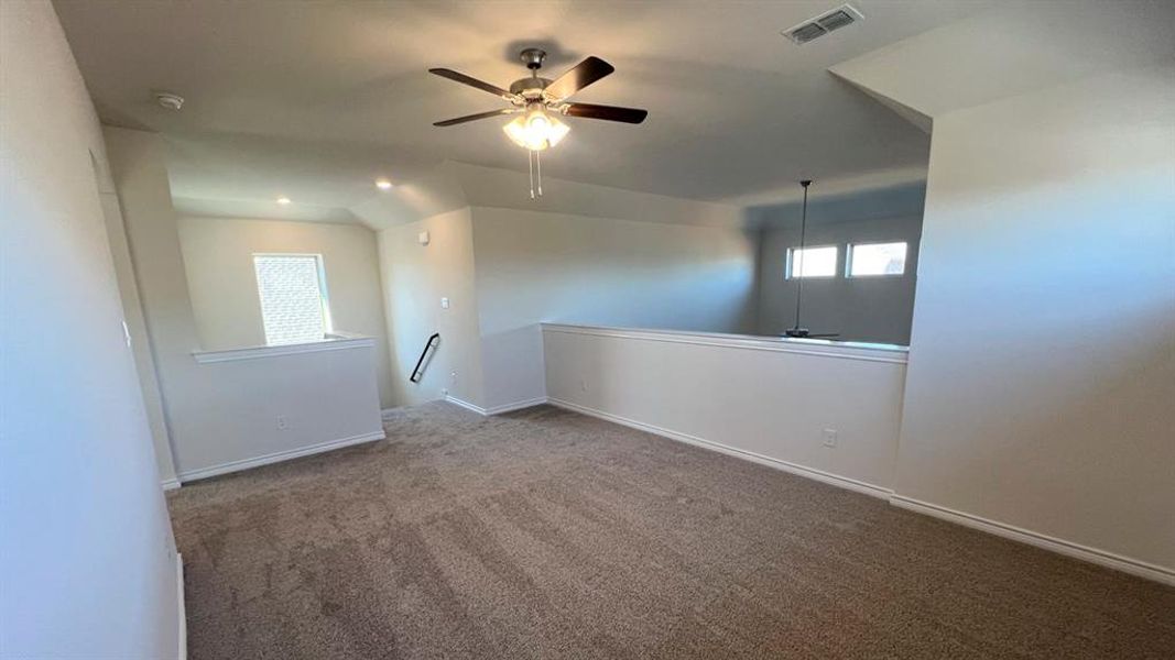 Spare room featuring ceiling fan, carpet floors, and recessed lighting