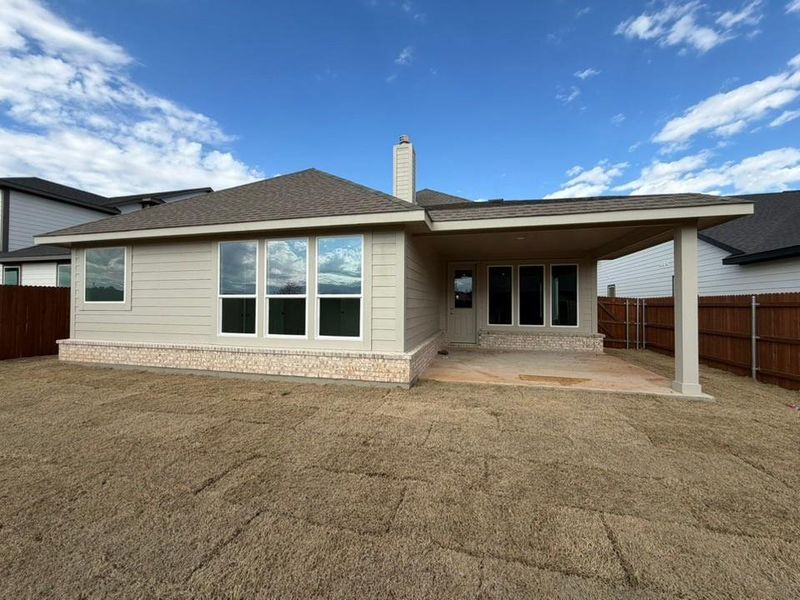 Exterior details and patio area of a home in Covenant Park, Springtown (Image 3).