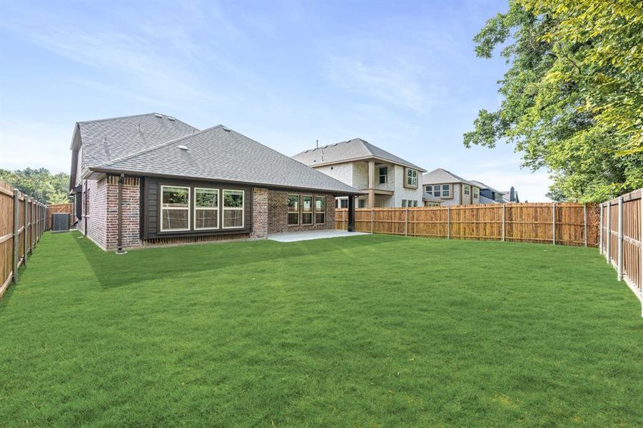 Front exterior of a new home in East Oak Creek 50-55, Commerce, TX, highlighting curb appeal (Image 26).