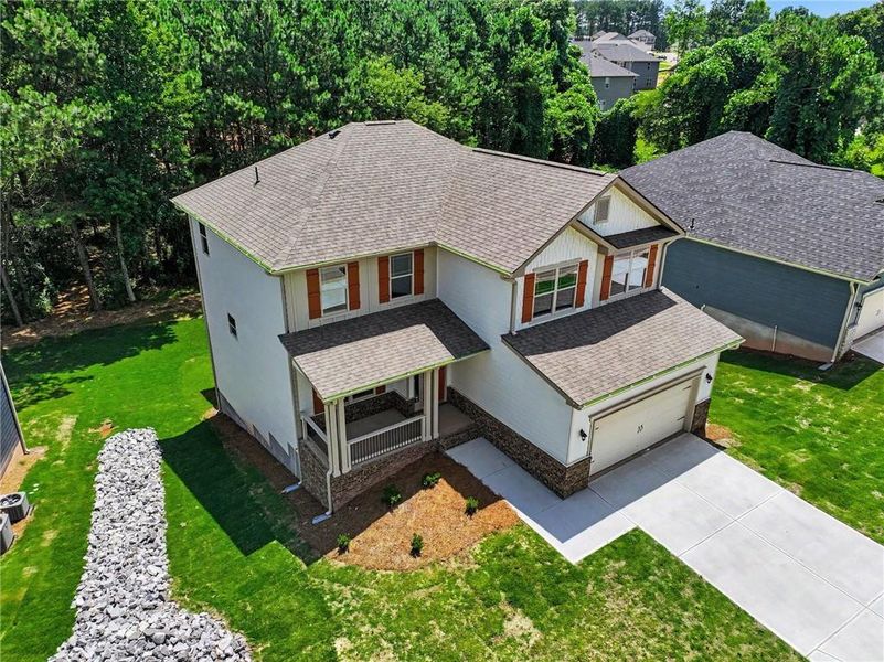 Front exterior of a new home in Magnolia Villas, Cornelia, GA, highlighting curb appeal (Image 20). Front exterior of a new home in Magnolia Villas, Cornelia, GA, highlighting curb appeal (Image 20).