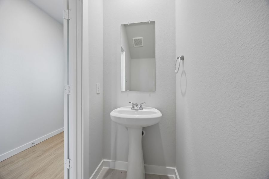 Bathroom in the Mesquite home plan by Trophy Signature Homes – REPRESENTATIVE PHOTO