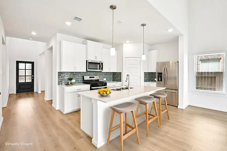 Photo is not of the actual home, but is an inspirational photo of builder’s model home and may depict options, furnishings, and/or decorator features that are not included