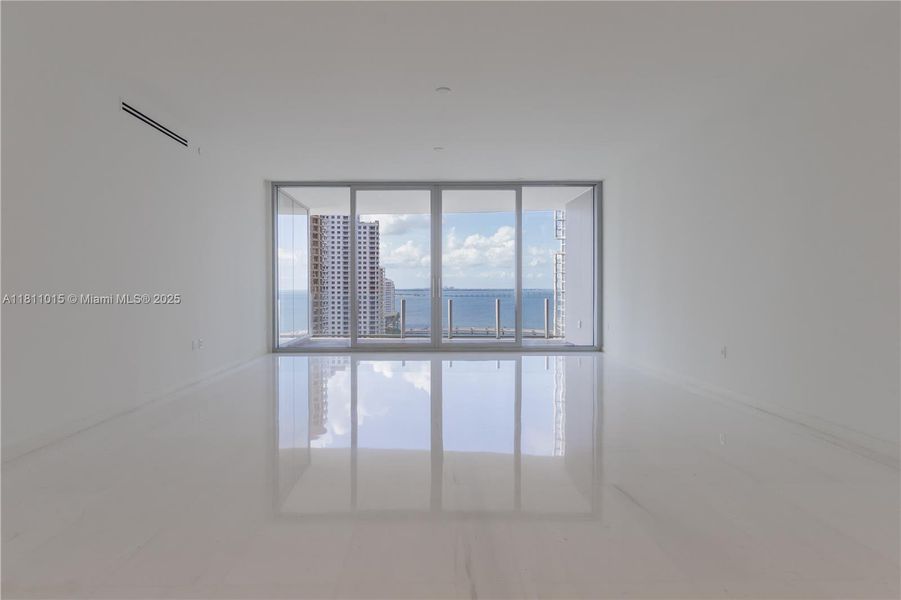 Spacious, unfurnished interior of a new home in Aston Martin Residences, Miami (Image 22).