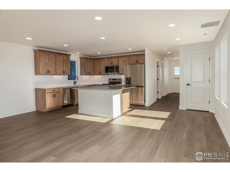 Furnished interior view inside a new home in Prairie Song Story Collection - Single Family Homes, Windsor (Image 4).
