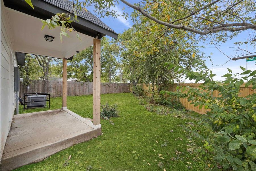 Fenced backyard featuring a patio area