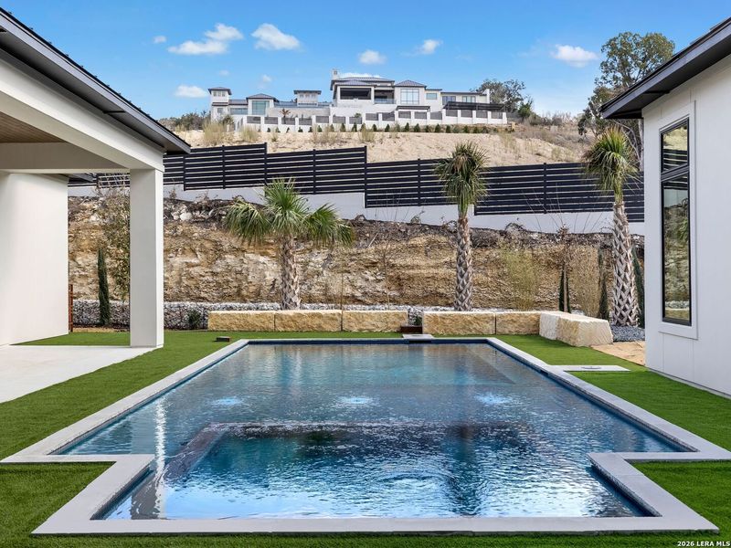 Exterior details and patio area of a home in , San Antonio (Image 37).
