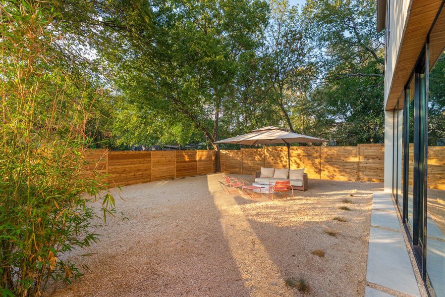 Exterior details and patio area of a home in , Austin (Image 24). Exterior details and patio area of a home in , Austin (Image 24).