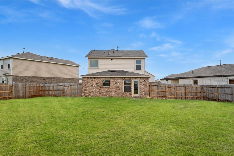 Exterior details and patio area of a home in , Katy (Image 24).