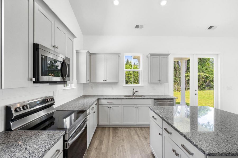 Furnished interior view inside a new home in Downtown Loris Homes, Loris (Image 12).