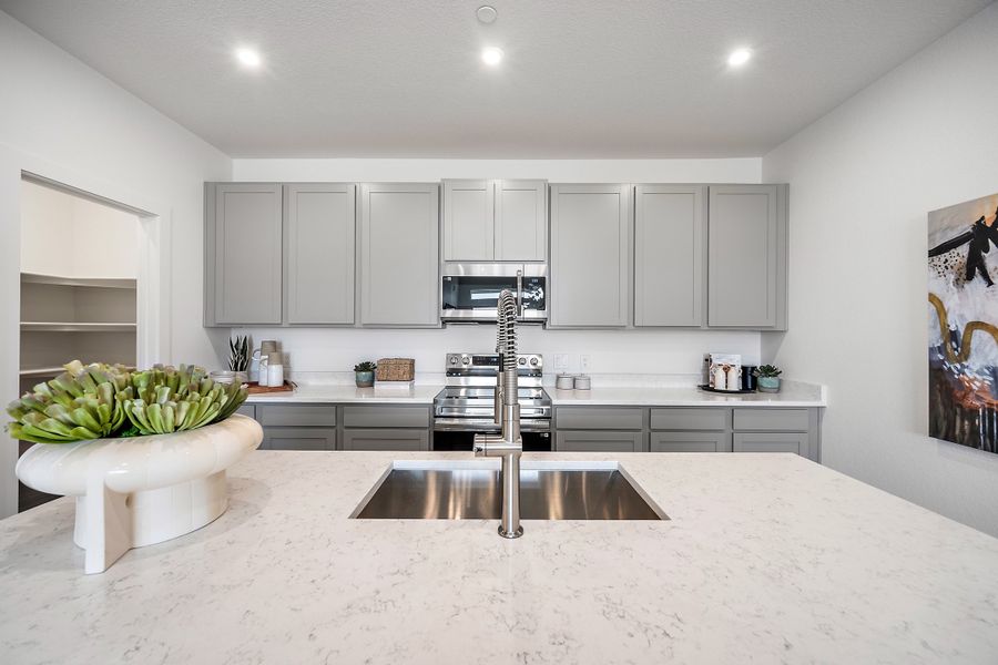 Furnished interior view inside a new home in Lyric at RidgeGate Condos, Lone Tree (Image 10).