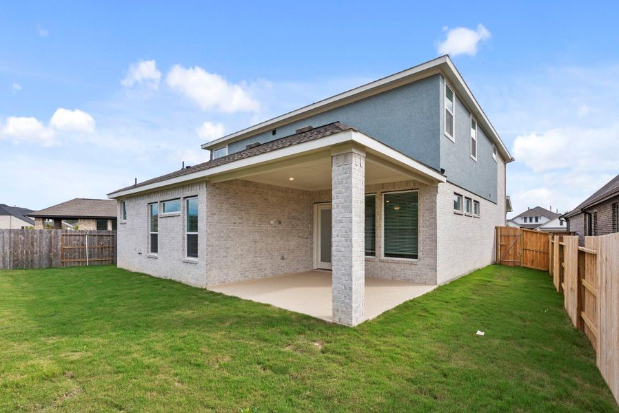 Exterior details and patio area of a home in The Trails, New Caney (Image 4).