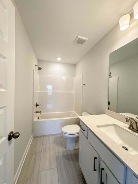 Furnished interior view inside a new home in The Paddock, Gallatin (Image 6).