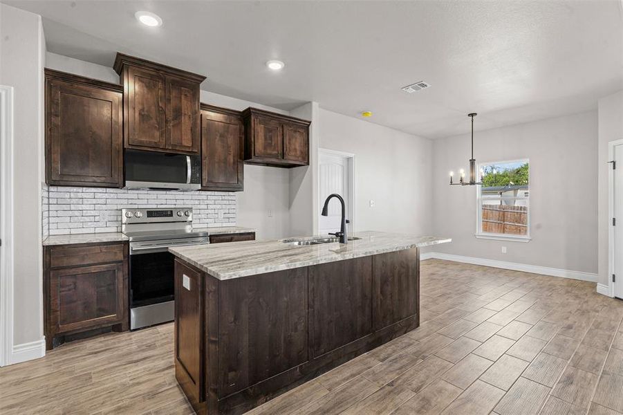 Furnished interior view inside a new home in , Granbury (Image 6).
