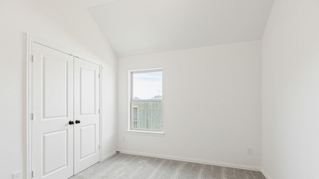 Furnished interior view inside a new home in Sunterra, Katy (Image 12).