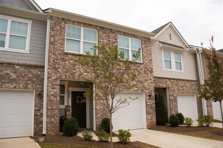 Front exterior of a new home in , Palmetto, GA, highlighting curb appeal (Image 2). Front exterior of a new home in , Palmetto, GA, highlighting curb appeal (Image 2).