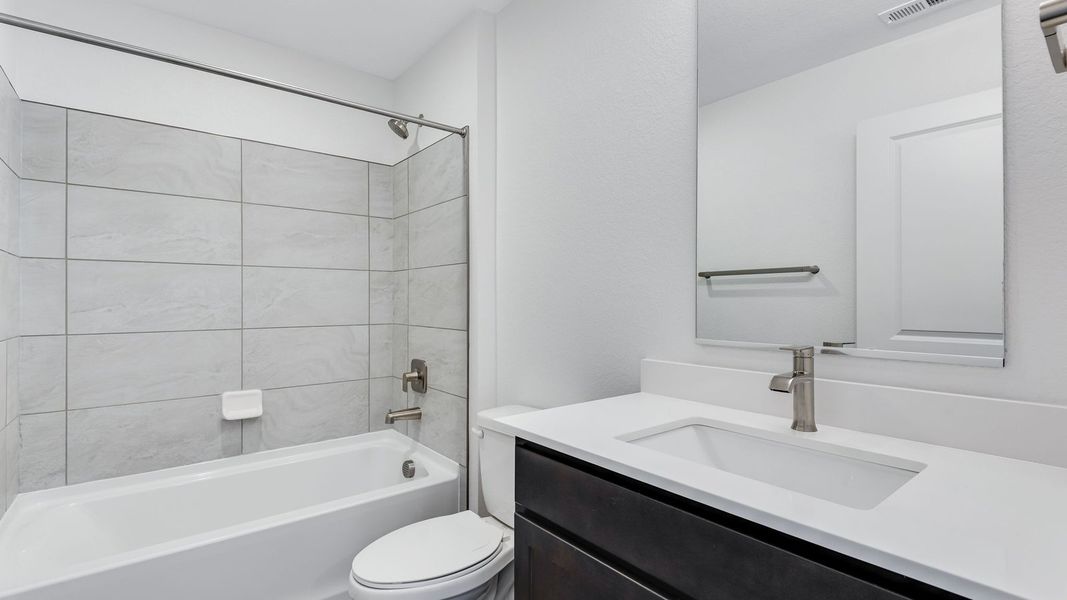 Furnished interior view inside a new home in Trails at Crowfoot, Parker (Image 8).