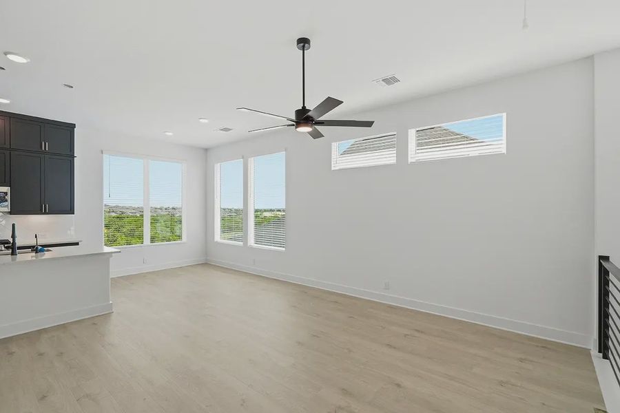 Representative unfurnished interior of a home built from the Athena by Chesmar Homes in Prominence Urban, San Antonio (Image 21).