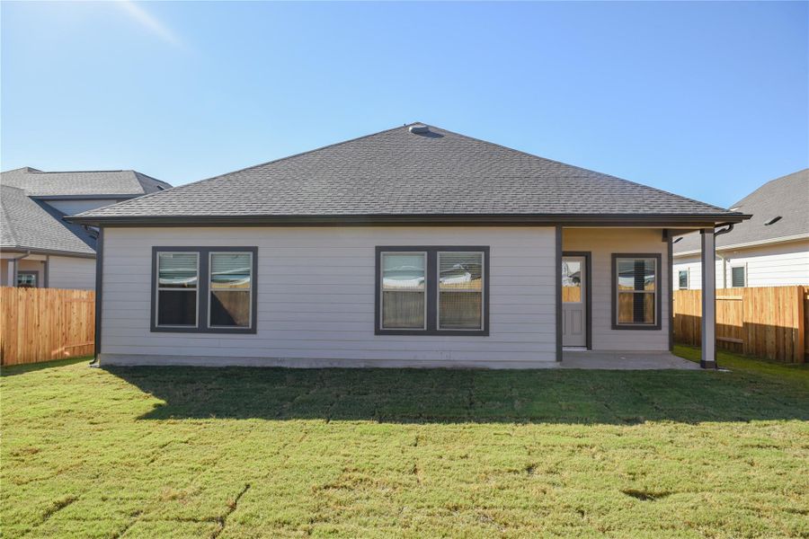 Rear of Home and Private Backyard