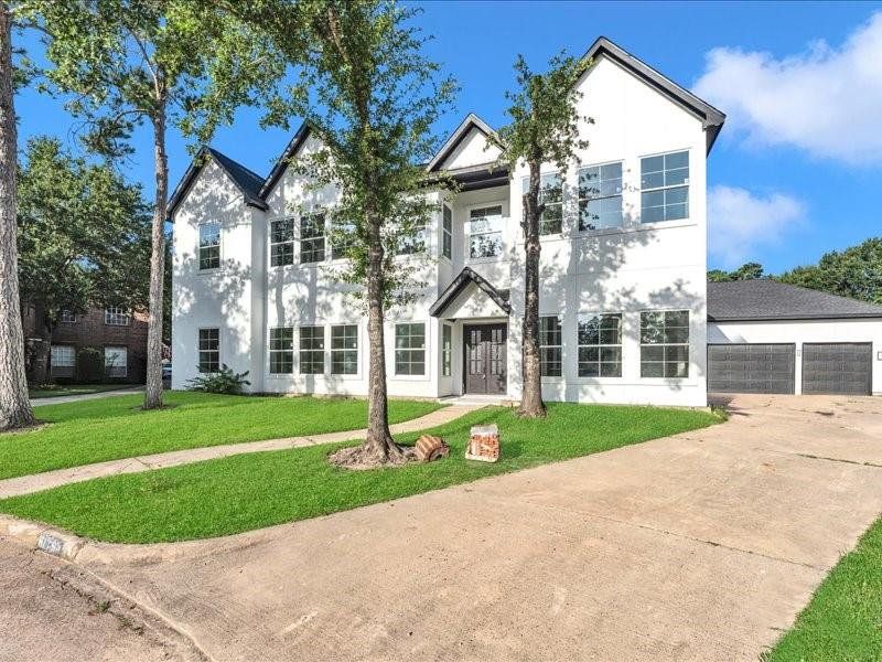 Front exterior of a new home in , Spring, TX, highlighting curb appeal (Image 28). Front exterior of a new home in , Spring, TX, highlighting curb appeal (Image 28).