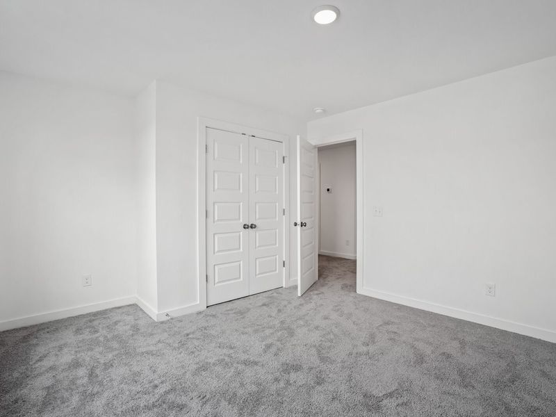 Spacious, unfurnished interior of a new home in Calista Farms, White House (Image 24).